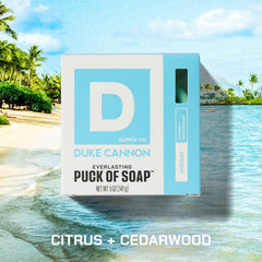 Disc-shaped soap puck from Duke Cannon for easy grip and even wash.