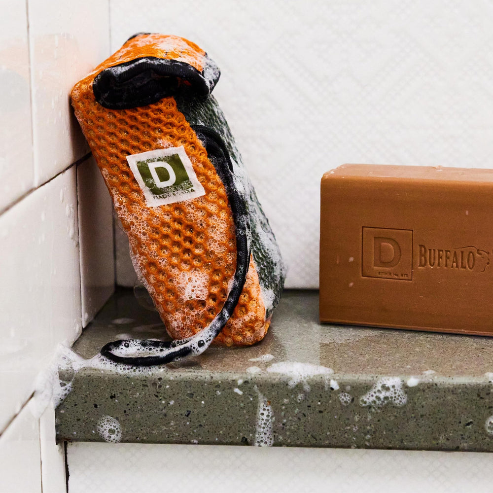 Duke Cannon Fresh Cut Pine scent enhances shower ambiance at home gym.
