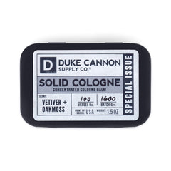Duke Cannon solid cologne tin closeup for travel-ready freshness.