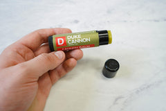 Duke Cannon Tactical Lip Protectant SPF15 Fresh Mint label close-up for refreshing protection