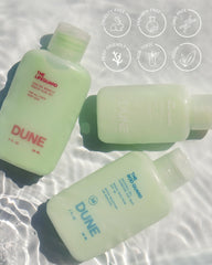 DUNE SUNCARE Jetsetter Gelly Mini body application demonstrates light, non-greasy sun protection.