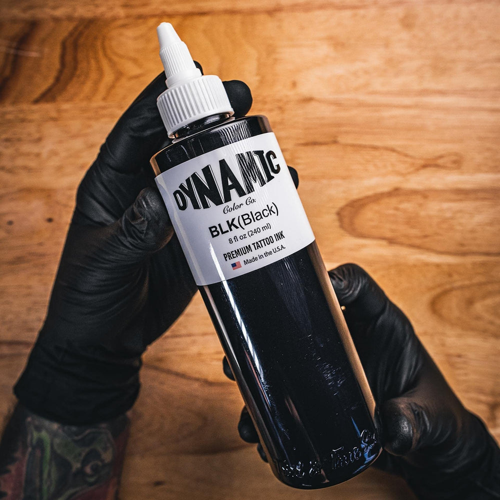 Black ink on skin example showing bold, crisp lines and rich tone