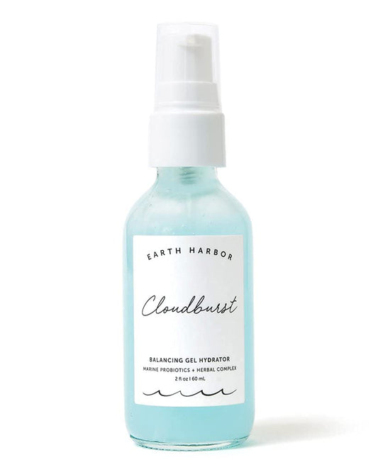 Earth Harbor Cloudburst bottle pour showing light hydration for daily use