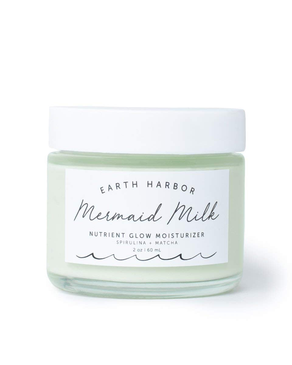 Earth Harbor Mermaid Milk bottle closeup showing lightweight hydration for daily use