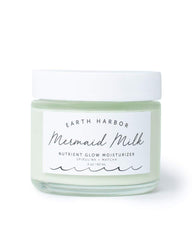 Earth Harbor Mermaid Milk bottle closeup showing lightweight hydration for daily use