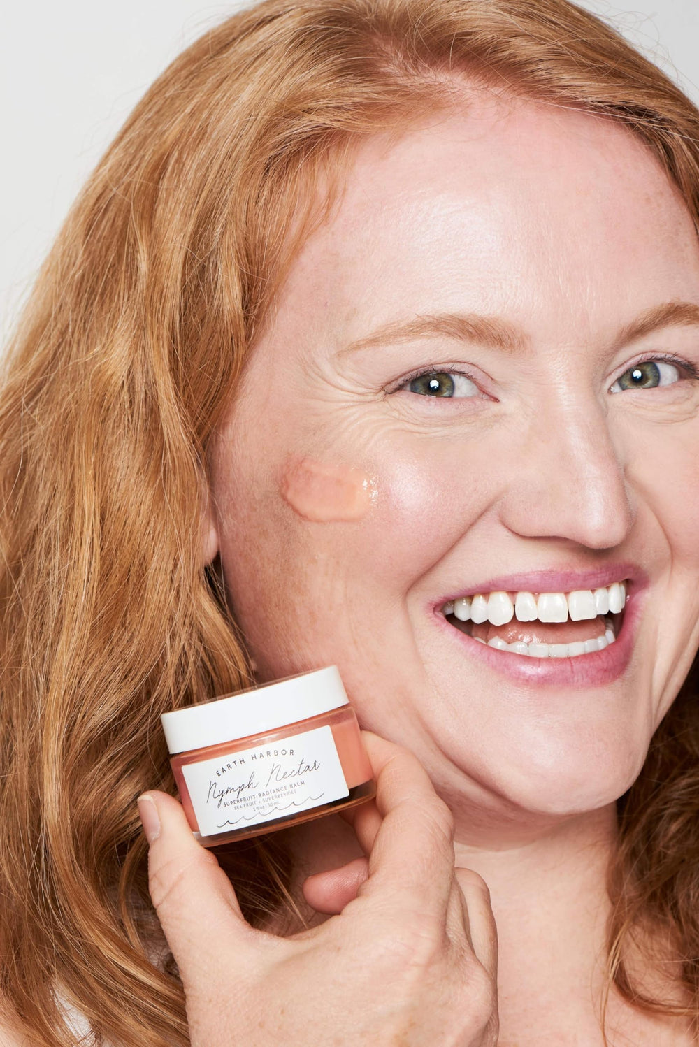 Earth Harbor NYMPH NECTAR luxurious packaging signaling premium skincare.