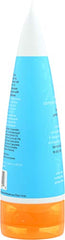 Applying Earth Science shampoo to dry hair to demonstrate targeted nourishment