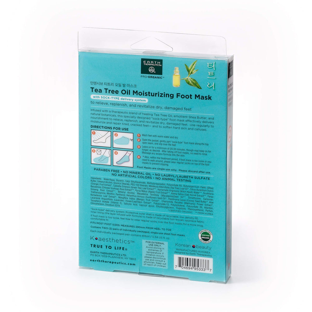 Earth Therapeutics Tea Tree Oil Foot Mask on feet with two pairs