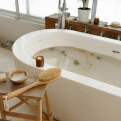 Earthborn Elements Lavender Epsom Salt spa setup evokes calm and self-care rituals.