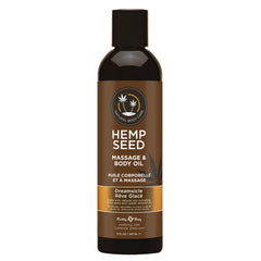 Earthly Body Dreamsicle massage oil bottle showing natural ingredients and calming slip.