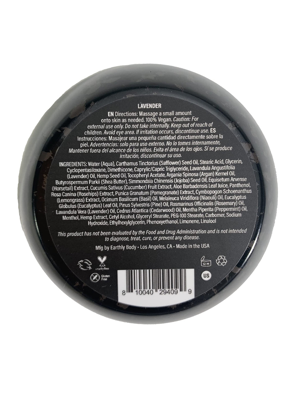 Earthly Body cream being applied to forearm for fast absorption.