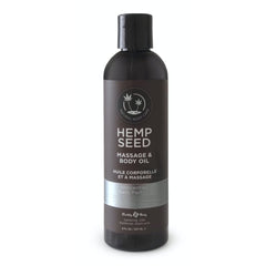 Earthly Body Hemp Seed Massage bottle pour shows smooth application and nourishment.