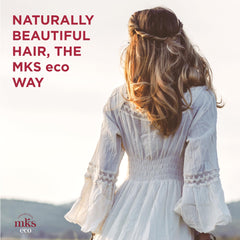 Earthly Body MKS eco Hydrate Conditioner dispenser shows smoothing, manageable hair results.