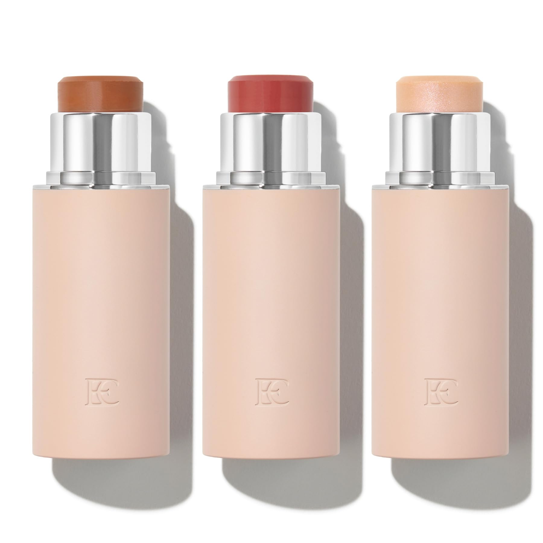 EarthsCure Glow Trio bronzer stick swatch adds warm, natural dimension.