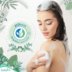 EcoEarth Spring Breeze conditioner bottle in a hotel bathroom amenity set.