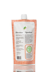 Frizz control with Ecoslay Orange Marmalade smoothing flyaways.
