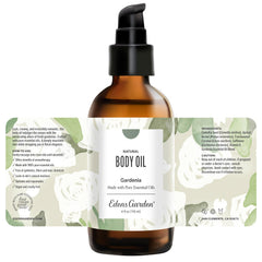 Edens Garden Gardenia Body Oil aromatherapy setup with candles and towel ambiance.