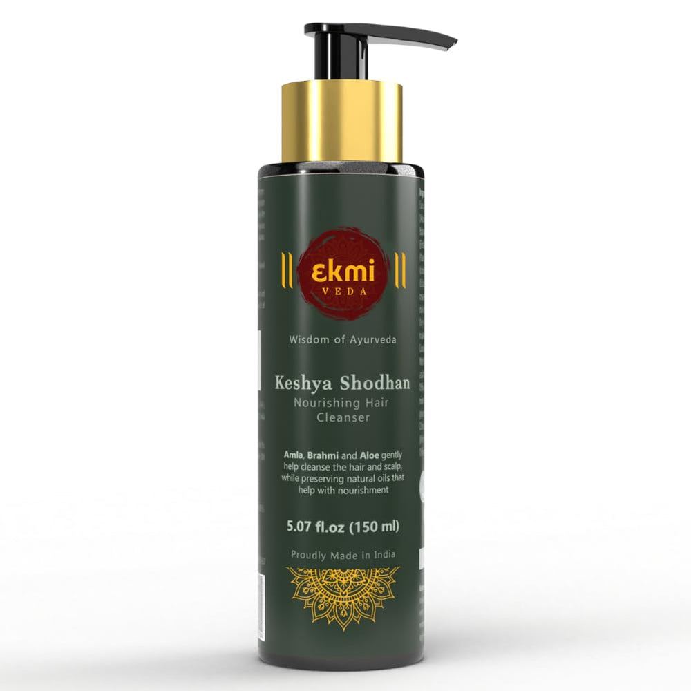 EKMIVEDA Keshya Shodhan bottle pour promotes gentle scalp cleansing.