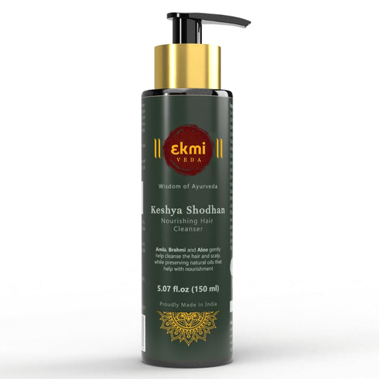 EKMIVEDA Keshya Shodhan bottle pour promotes gentle scalp cleansing.