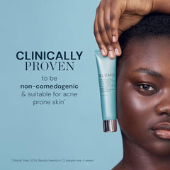 Applying Elemis Pro-Collagen SPF 50 to face and neck.
