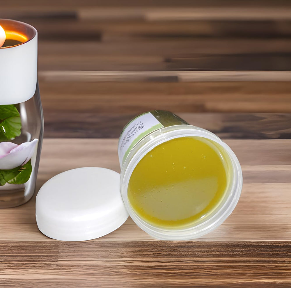 Ingredients closeup: Chebe powder, Karkar oil and herbs in Ella Chebe Hair Grease