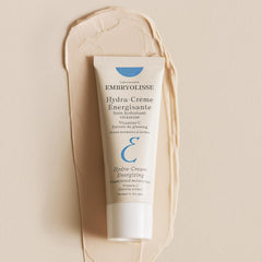 Bathroom shelf with Embryolisse Vitamin C Energizing Moisturizer suggesting daily use and glow.