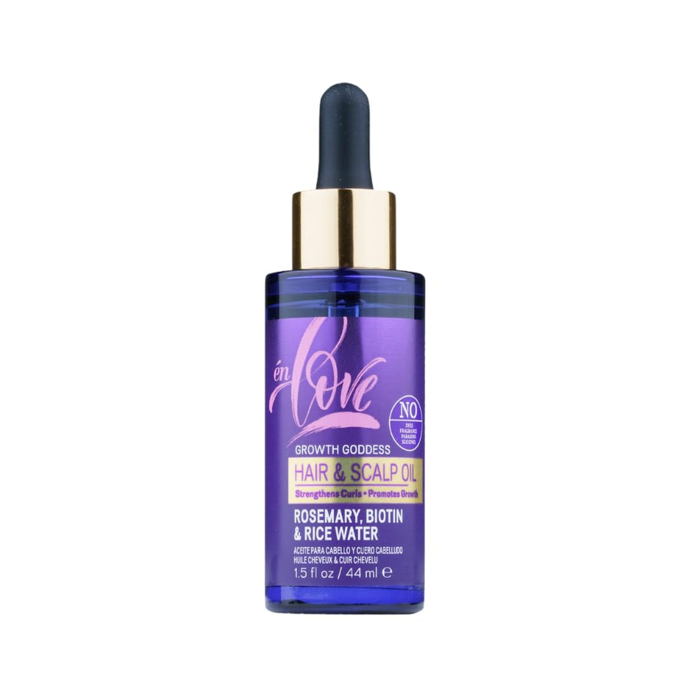 én Love Growth Goddess Oil bottle pour highlighting rosemary infusion for hair vitality.