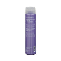Enjoy Balancing Shampoo bottle pour showing sulfate-free formula.
