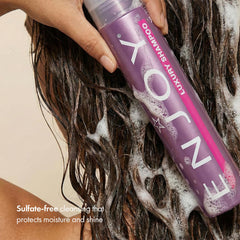 Enjoy Luxury Shampoo lather close-up for gentle cleansing without sulfates.