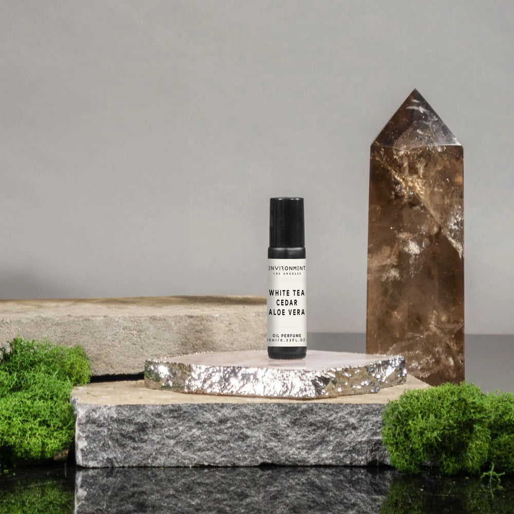 ENVIRONMENT WSTN roll-on application on skin for quick aroma uplift.