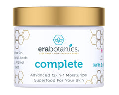 Era Organics face moisturizer jar closeup showing creamy texture for daily hydration