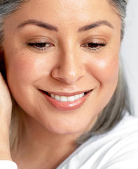 Ere Perez satin-finish concealer applied on face under eyes for natural brightness