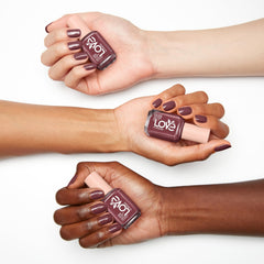 Brush applying LOVE by essie for a smooth at-home manicure.
