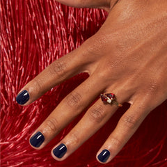essie Step Out of Line on nails: glossy cream finish for a chic manicure.
