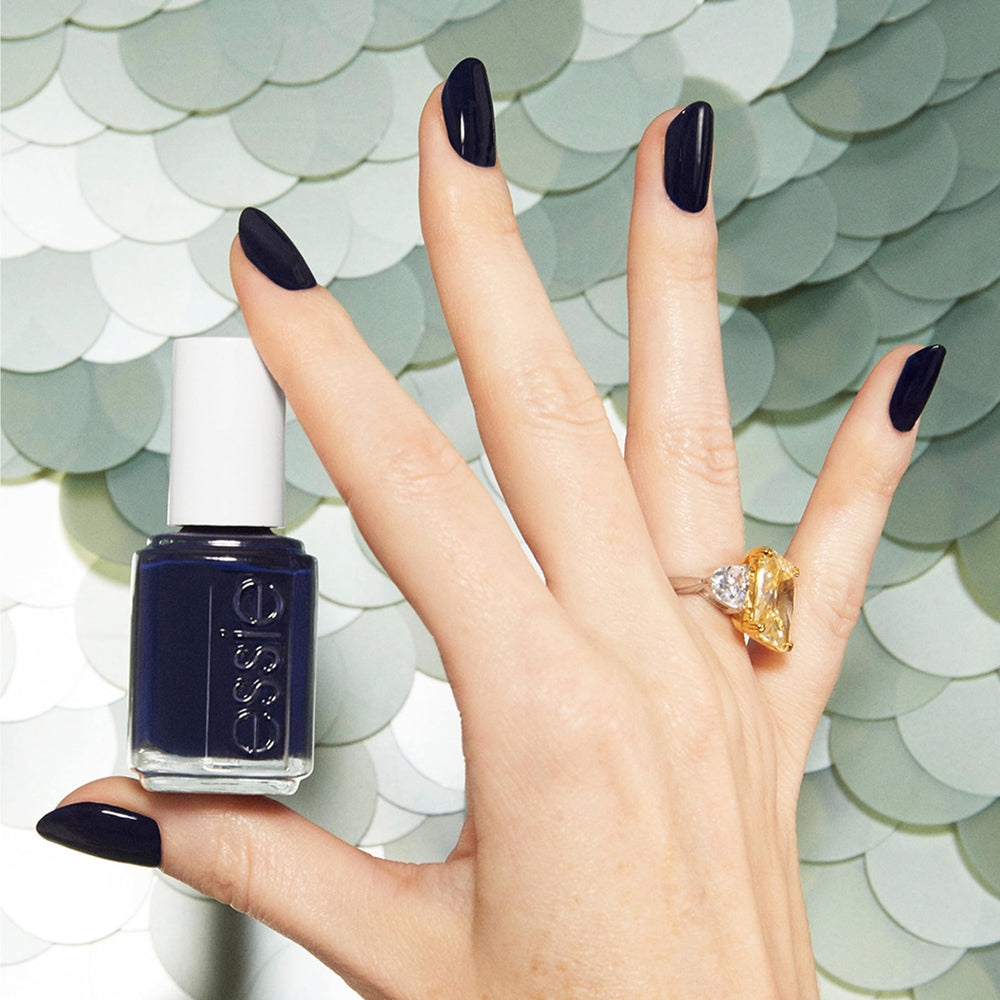 essie Step Out of Line color swatches showing deep indigo hue with warmth.