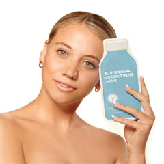 Applying ESW Beauty The Blue Dream mask on the face for hydration