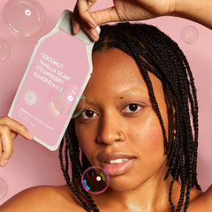 User applying ESW Beauty Strawberries & Cream mask with calming, cooling feel.