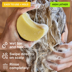 Ethique Shampoo and Conditioner Set in use on sink