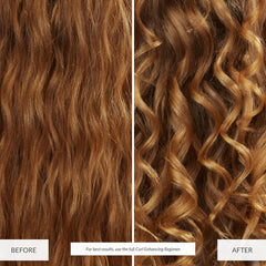 Applying Eufora conditioner to damp hair for detangling.
