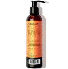 Eve Hansen Vitamin C Toner mist in hand shows refreshing application.