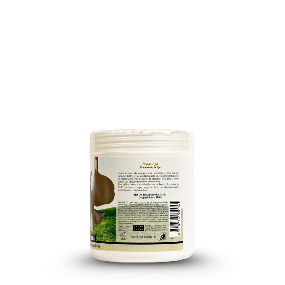 Applying Ever Ego Garlic Mask on hair for deep hydration.