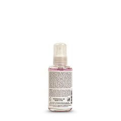 Ever Ego Garlic Serum on damp hair for shine and smoothness.