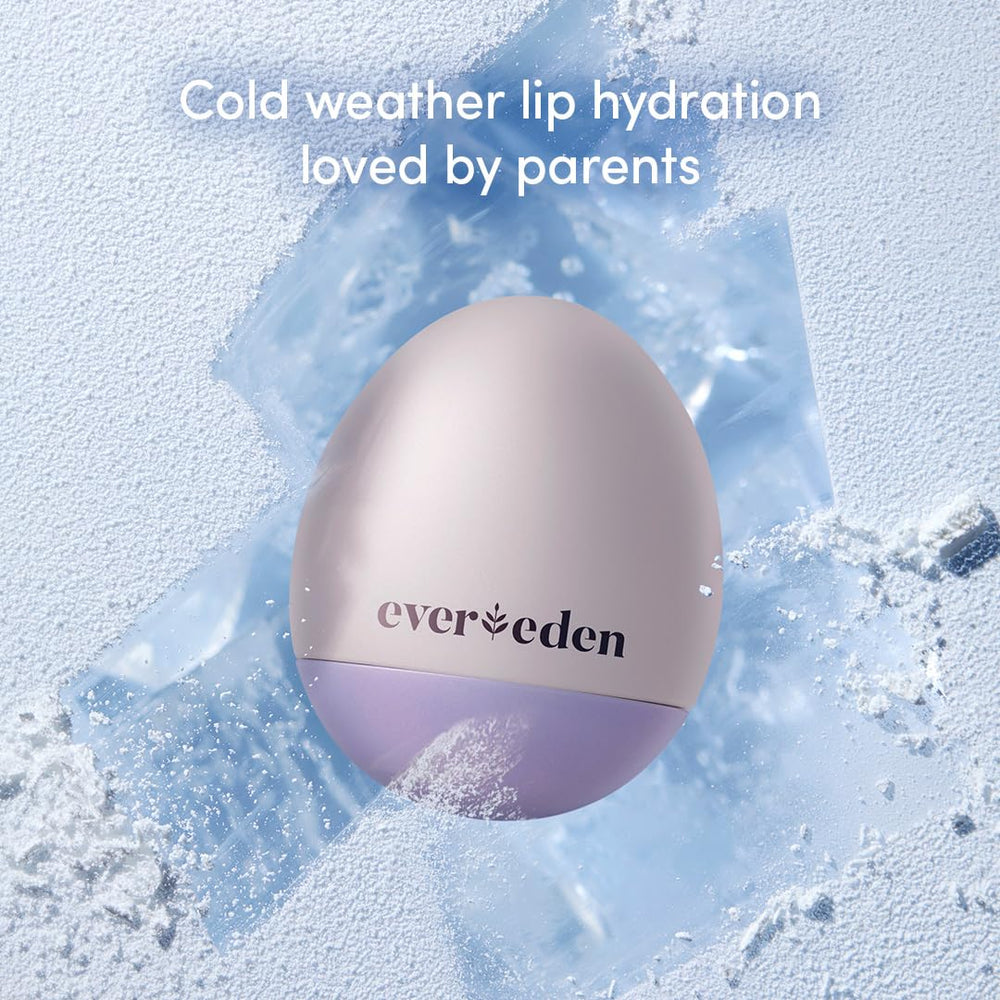 Evereden lip balm in a winter outdoor scene guarding lips against cold wind.
