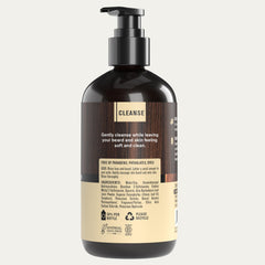 Foam texture on skin highlights the wash's creamy, cleansing action with vanilla cedar