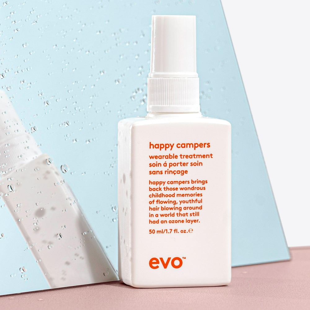 Damp hair with EVO Happy Campers for a style-ready finish