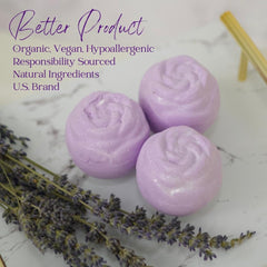 Lavender Dreams bath bomb dissolving, releasing fragrance and color in tub