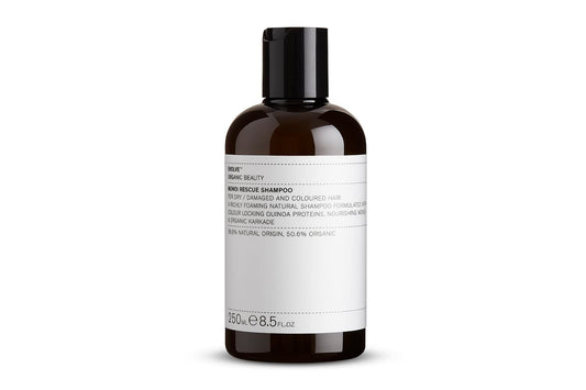 Evolve Organic Beauty Monoi Rescue Shampoo bottle pour demonstrates easy application and hydration