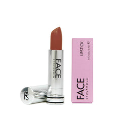 FACE Stockholm Naked lipstick in hand, ready for a polished everyday look.