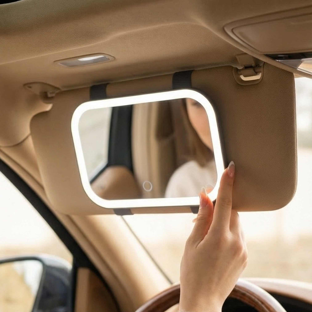 Fancii Juni universal fit clip secured to a car visor for versatile attachment