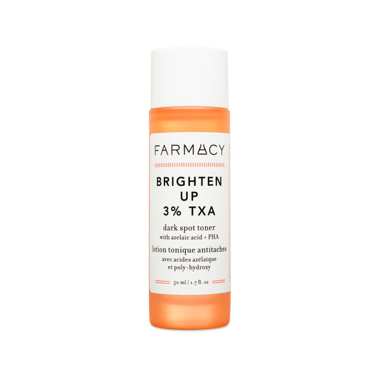 Farmacy 3% TXA brightening toner bottle closeup reveals glow-enhancing formula